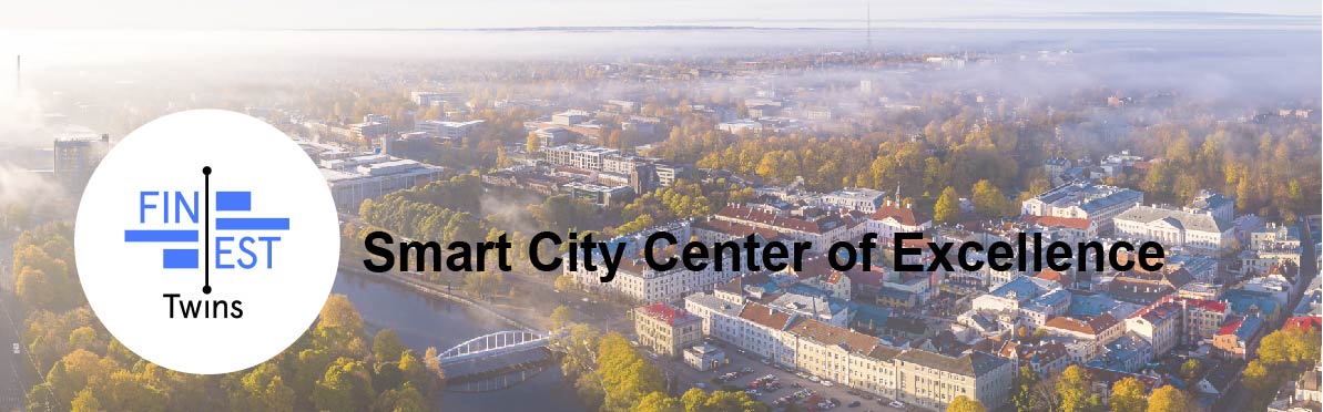 Aerial image of a city center and FinEstTwins logo