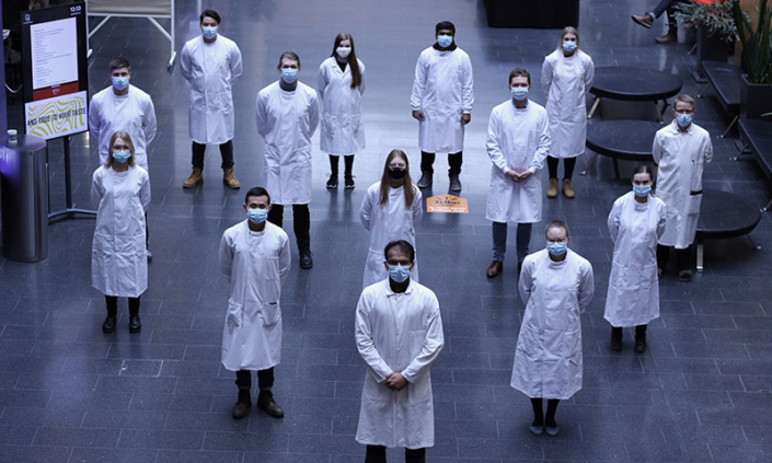 Finnadvance team in lab coats and face masks
