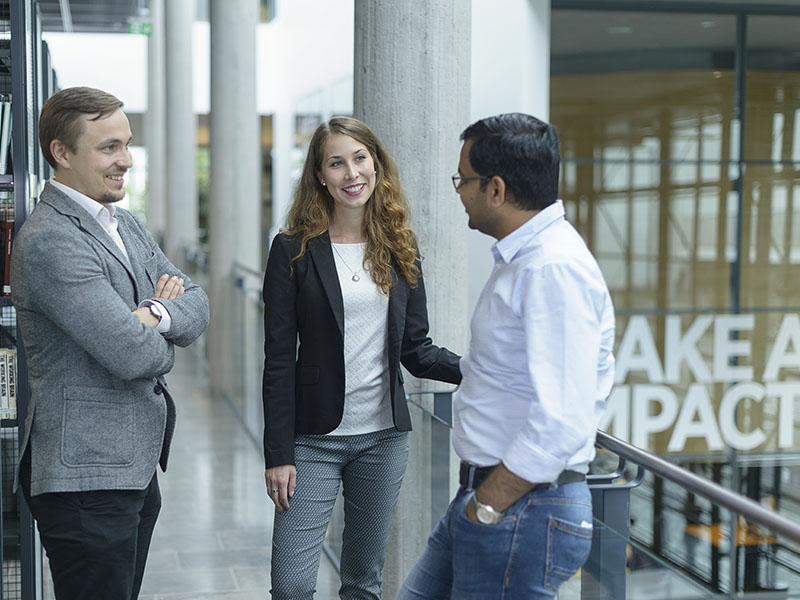 Three Jasmine Pro team members discussing in Terkko Health Hub