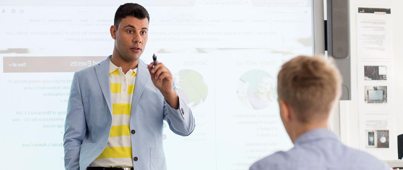 A man teaching another man